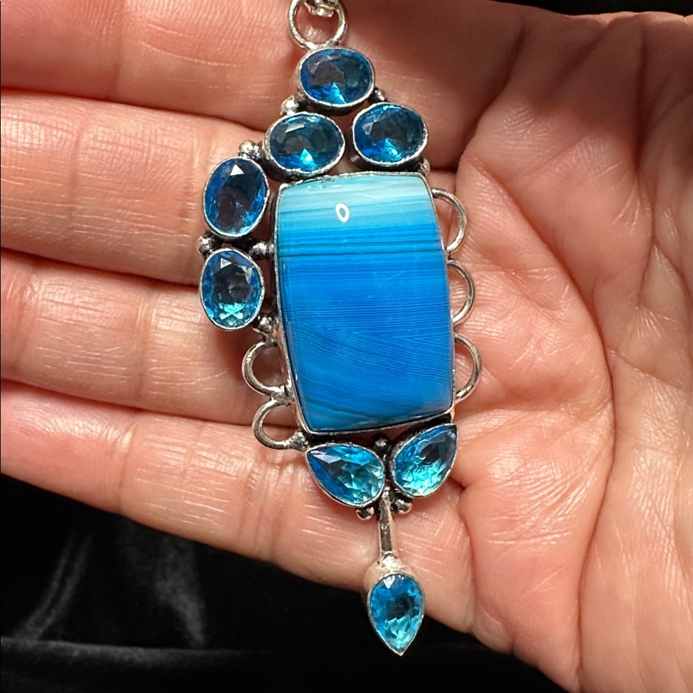 Handcrafted Artisan Jewelry Agate Stone Pendant Surrounded by Blue Topaz Stones